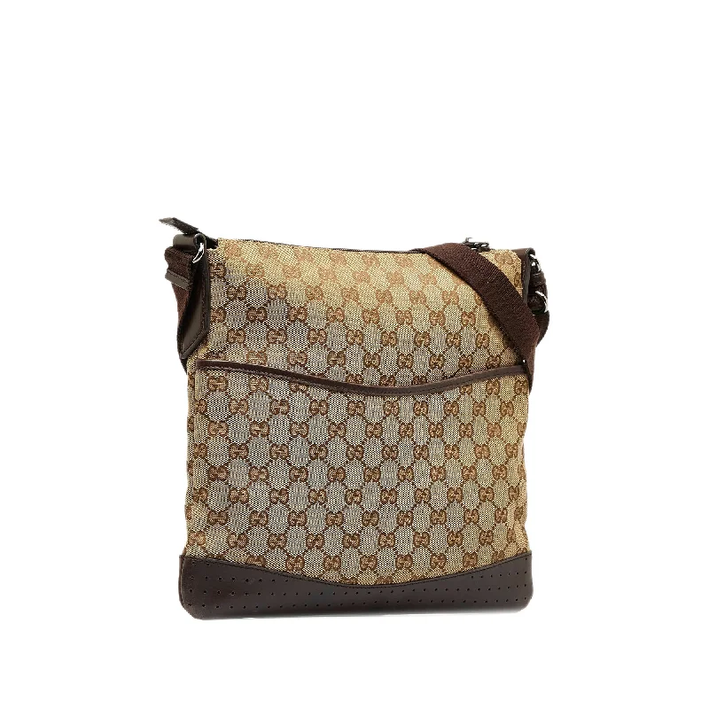 Women Gucci Sylvie bags featuring the signature web stripeGUCCI GG Canvas Crossbody Crossbody Bag