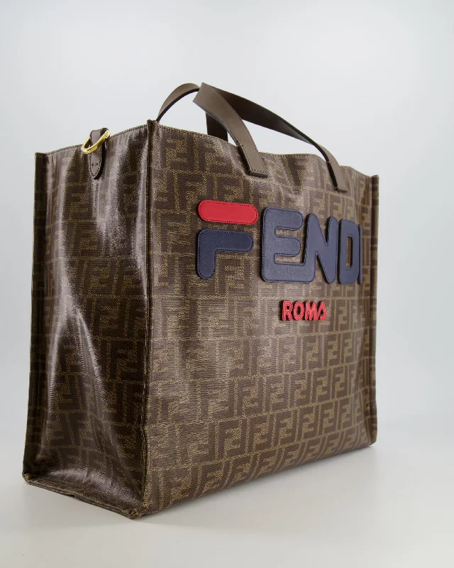 Fendi handbags with a perforated leather detail for a breathable and unique designFendi x Fila Brown FF Monogram Printed Large Tote Bag