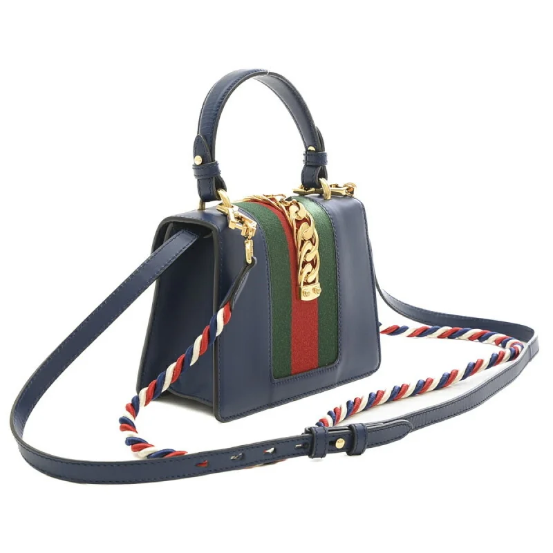 Women Gucci bags with a magnetic snap closure for easy accessGUCCI Sylvie Top Handle 2Way Bag Leather Navy 470270