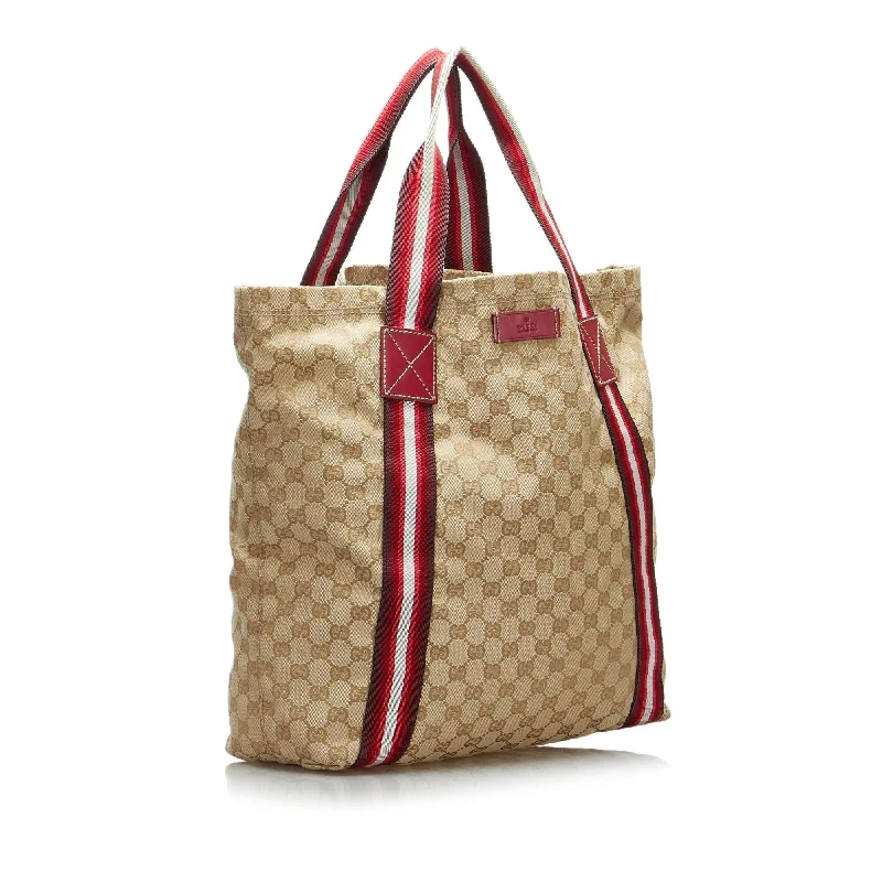 Ladies Gucci Dionysus bags in a pastel colorGucci GG Canvas Web Tote (SHG-X8bRab)